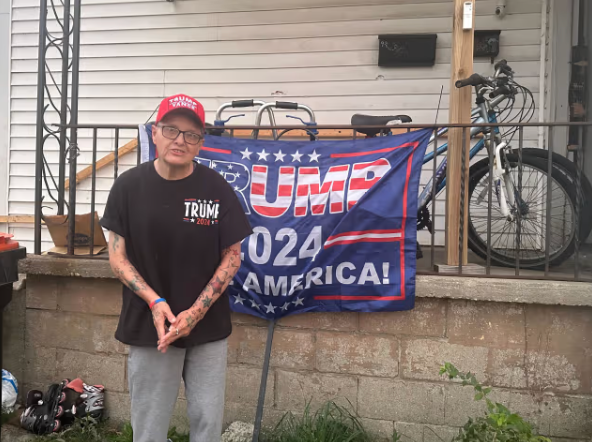 Anna Kilgore in Springfield, Ohio with a Trump-Vance hat and flag. The Springfield resident told police last month that her Haitian neighbors may have stolen her cat Miss Sassy. The cat turned out to be hiding in her basement the whole time, and she apologized to her Haitian neighbors